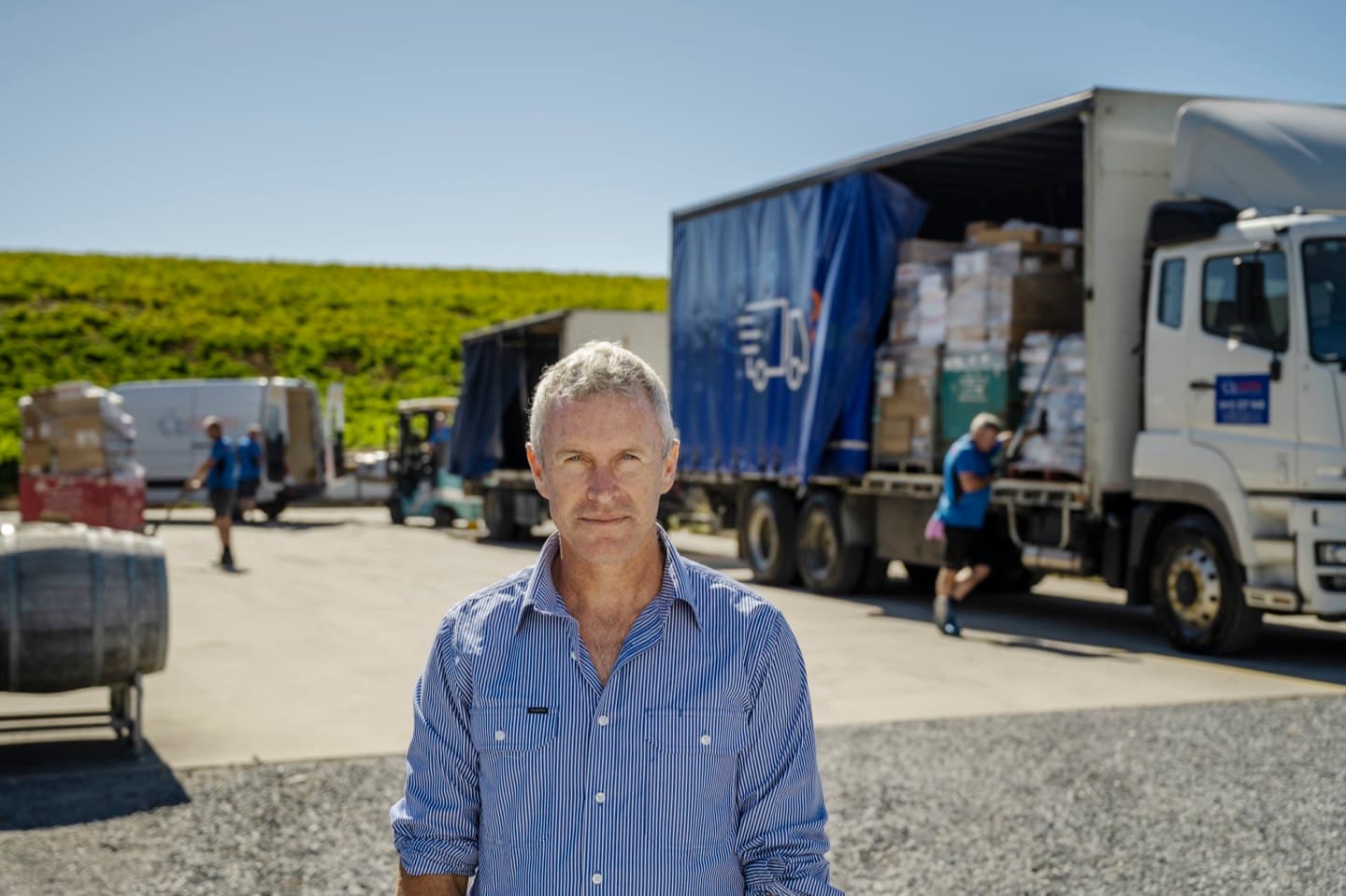 The team behind Fleurieu Logistics in front of a loaded truck in McLaren Vale